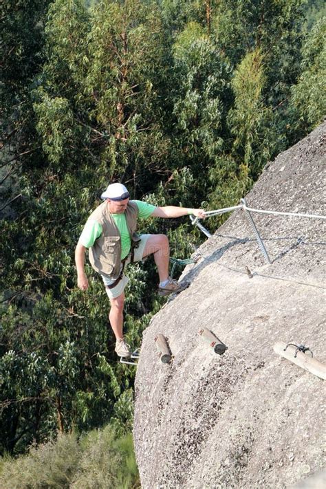 Man climbing rock stock photo. Image of help, mountain - 23184530