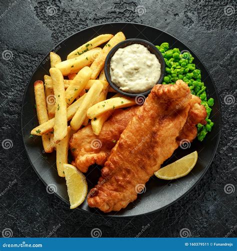 Fish And Chips Sauce : Homemade Fish and chips with double-fried chips ...