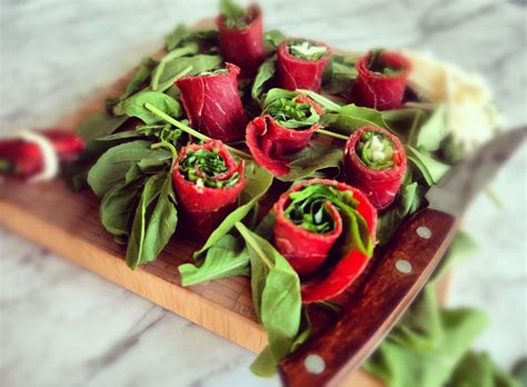 bresaola wrapped in rucola and cheese