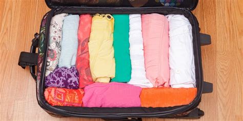 How to Fit Clothing in a Suitcase — How to Travel With Only a Carry On