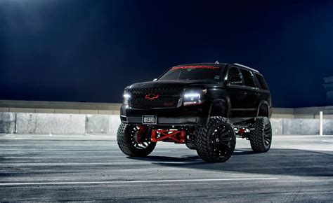 Lifted Custom Chevy Tahoe with Red Bow Ties — CARiD.com Gallery