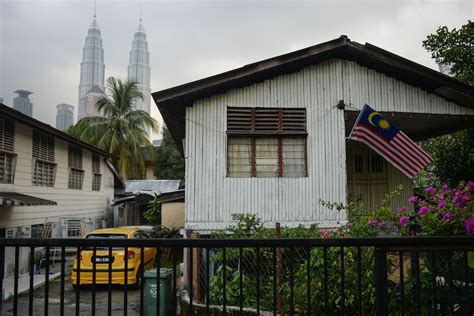 Kampung Baru survives as a slice of village life in the middle of one ...