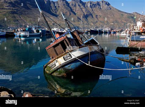 Sunken boat in Hout Bay Harbour near Cape Town, South Africa Stock ...