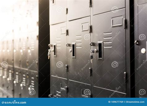 Close Up on Black Lockers in Gym, Wall of Lockers. with Key, Stock ...