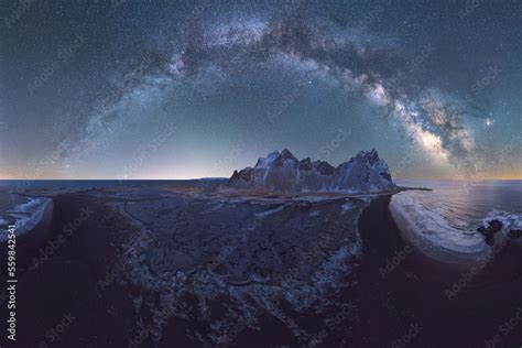 Amazing view of snowy mountain under starry sky at night Stock Photo ...