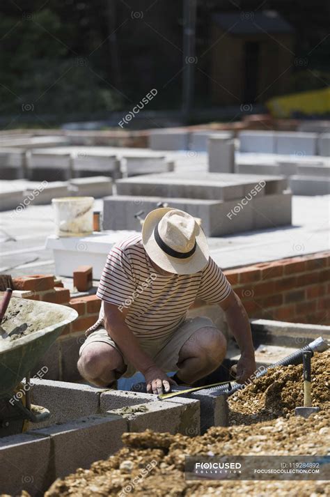 Man working on a construction site — Obscured Face, lifestyles - Stock ...