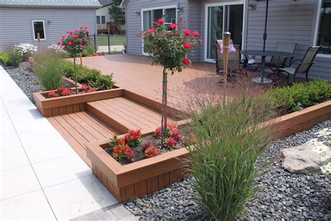 composite deck with built in landscaping | Backyard landscaping, Sloped ...