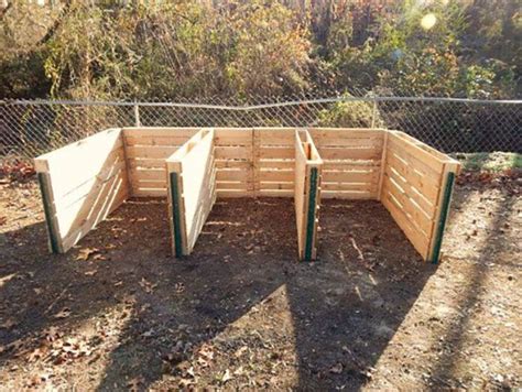 a fenced in area with wooden posts