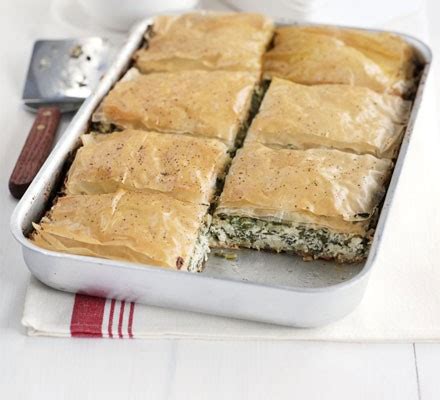 Cheesy spinach bake recipe | BBC Good Food