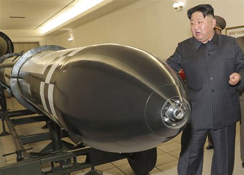 North Korea's Kim Jong Un unveils new tactical nuclear warhead