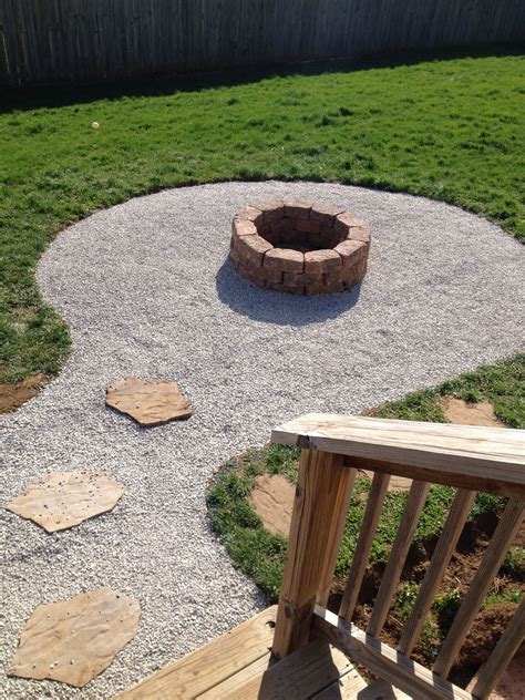 My backyard firepit with seating area. Stones from Lowes $2.25 a piece ...