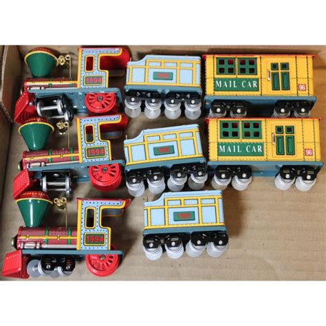 THREE TIN TRAIN CHRISTMAS TREE ORNAMENTS