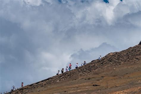 Premium Photo | Climbing one of the main overlooks that bartolme island ...