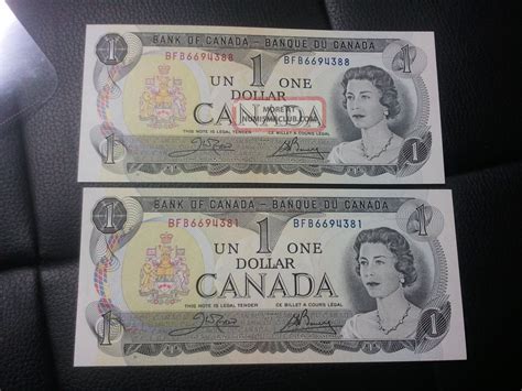 1973 Canadian One Dollar Bills. 2 Uncirculated. Crisp And