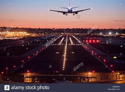 A plane landing at sunset Stock Photo: 113248767 - Alamy