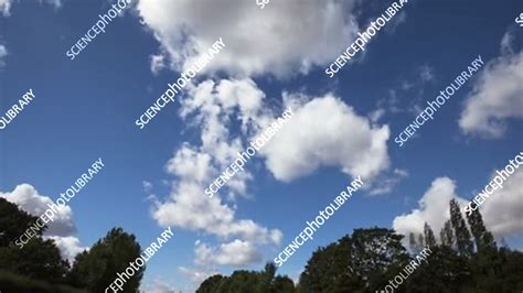 Timelapse of cumulus clouds forming on a summer morning - Stock Video ...