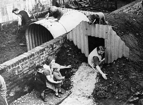 Neighbors assemble Anderson air raid shelters in their backyard gardens ...