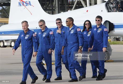 US space shuttle Discovery crew members arriving at Kennedy Space ...