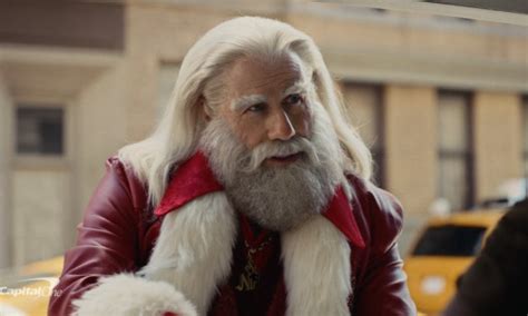 John Travolta Shines As Santa in Capital One’s Holiday Ad | DesignRush