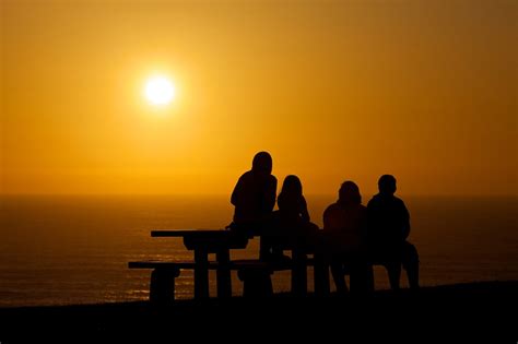 cannonbeachphoto-beach-family-enjoying-sunset-original - Escape Lodging