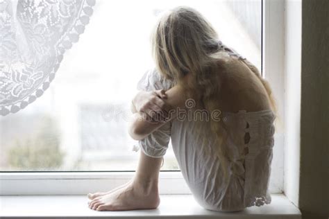 Girl Sitting on the Window Still Stock Photo - Image of young, youth ...