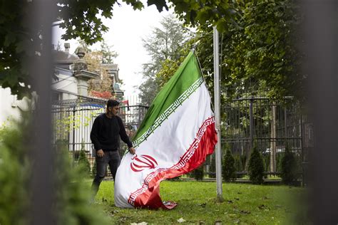 Swiss police violently disperse anti-Iran protest at embassy | AP News