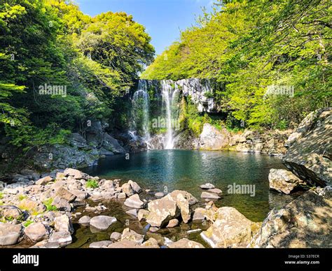 Waterfall in Jeju island Stock Photo - Alamy