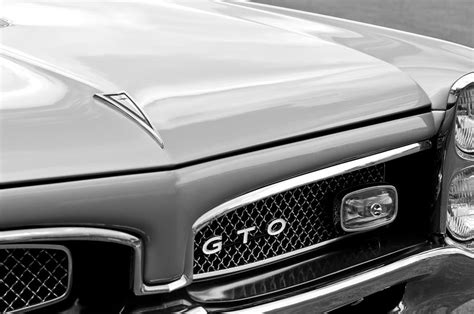 1967 Pontiac Gto Grille Emblem Photograph by Jill Reger