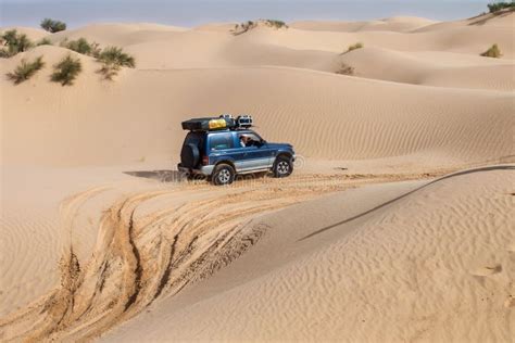 4X4 Vehicle Drives Around the Sand Dunes of the Sahara Desert ...