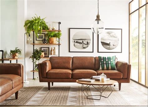 brown leather sofa black and white photos mid century modern living ...