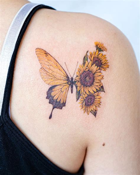 Pin by Tori Palmer on Tattoos | Sunflower foot tattoos, Butterfly ...