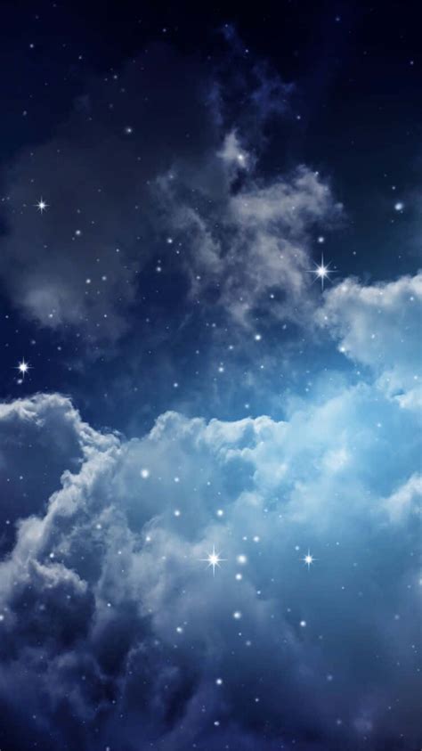 Download Magical Night Sky With Many Stars Shining On Large Clouds ...