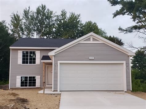 Transform Your Gray House with Stunning White Shutters - See the ...