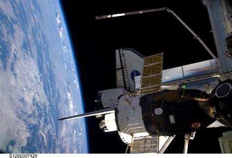 ESA - View from the ISS showing Space Shuttle Discovery and a Soyuz ...