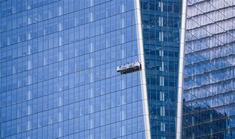 Cleaning the Windows of Some Tall Skyscraper Buildings. Workers are ...