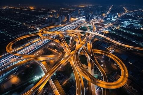 Premium Photo | An aerial view of a highway intersection at night