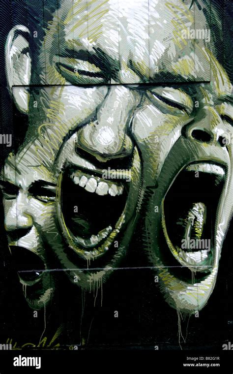 Graffiti screaming faces Stock Photo - Alamy