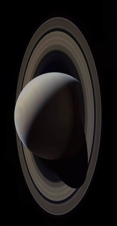 saturn's rings are seen in this image taken by nasa spacecrafts on ...