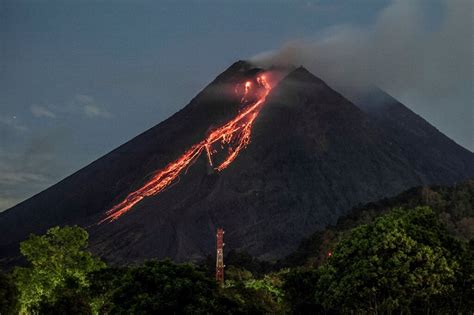 Indonesia volcano erupts, spews red-hot lava