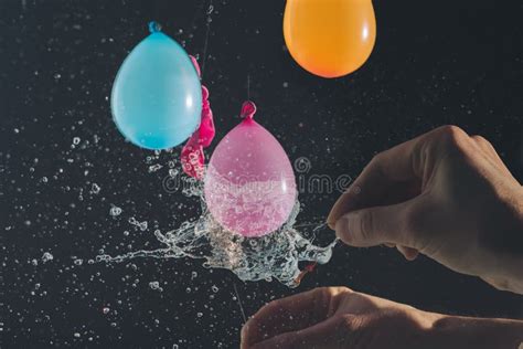 Popping water balloon stock photo. Image of background - 65713734