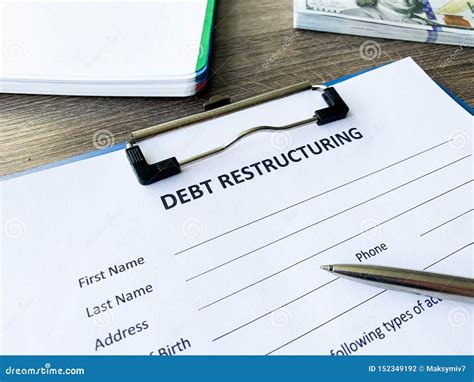 Debt Restructuring Document with Graph on Table. Stock Photo - Image of ...