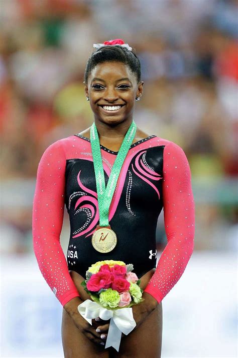 Simone Biles wins two more gold medals at world championships ...