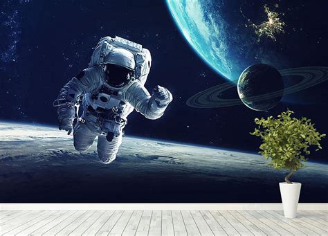 Astronaut at spacewalk Wall Mural Wallpaper | Canvas Art Rocks