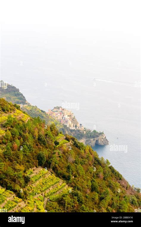 The little town of Corniglia in the Cinque Terre in Liguria, Italy seen ...