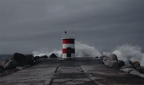 Premium Photo | Lighthouse on the Atlantic ocean coast in a storm