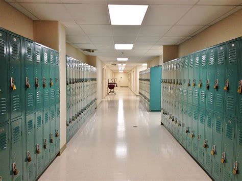 rows of lockers in a school hallway | Playspace Design