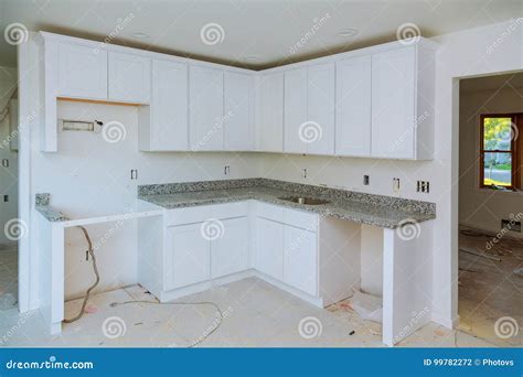 Installing New Induction Hob in Modern Kitchen Stock Photo - Image of ...