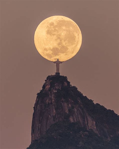 The Mountaintop Christ the Redeemer Statue Cradles the Moon in Rio de ...