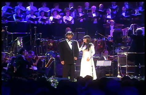 Sarah Brightman and Andrea Bocelli perform "Time to Say Goodbye".