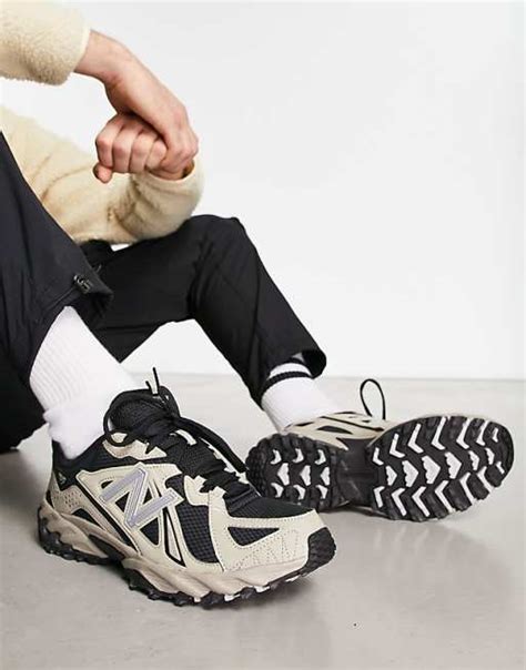 New Balance 610 trainers in black and tan | ASOS